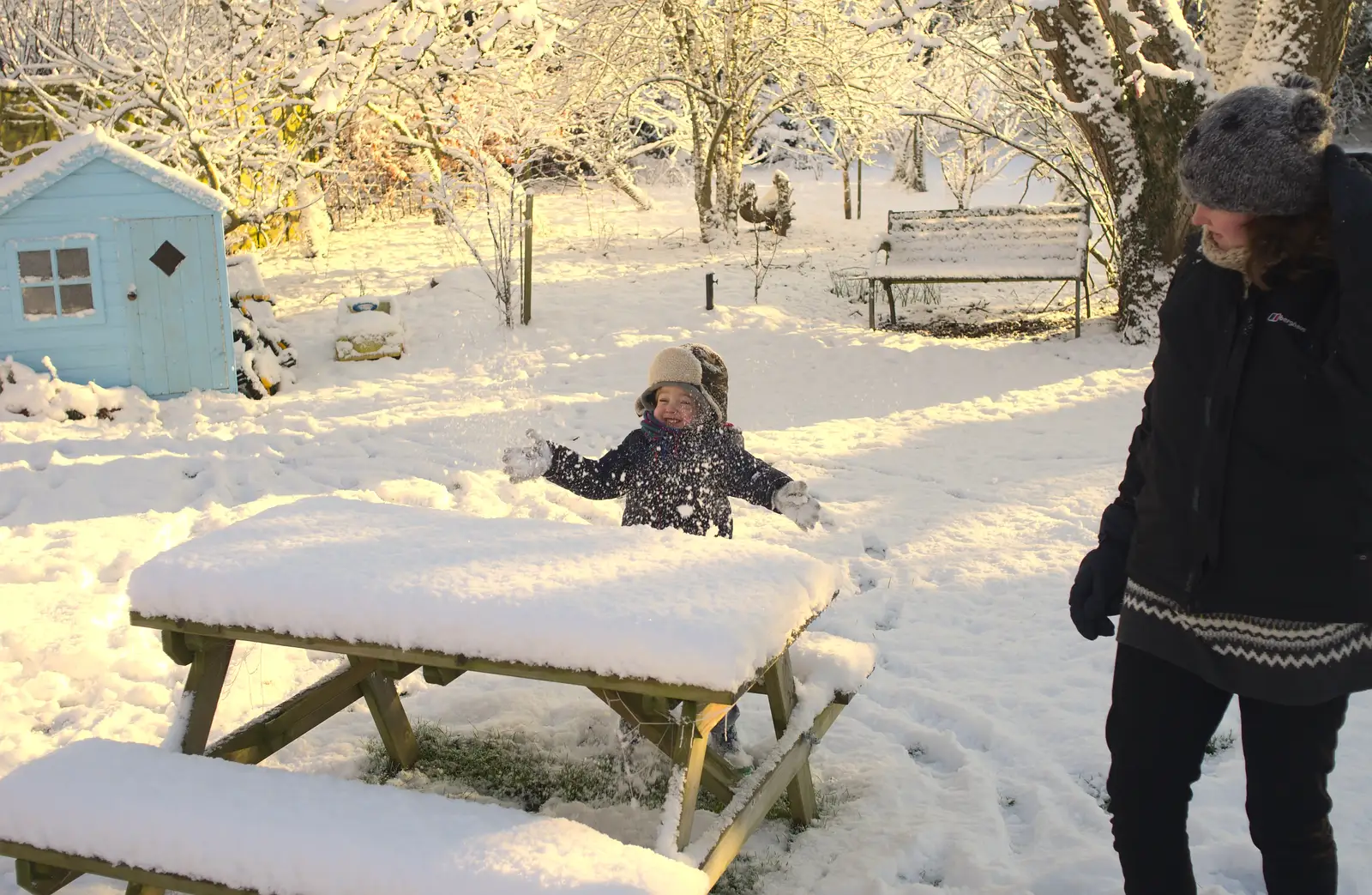 Fred sweeps snow of the table, from A Couple of Snow Days, Brome, Suffolk - 16th January 2013