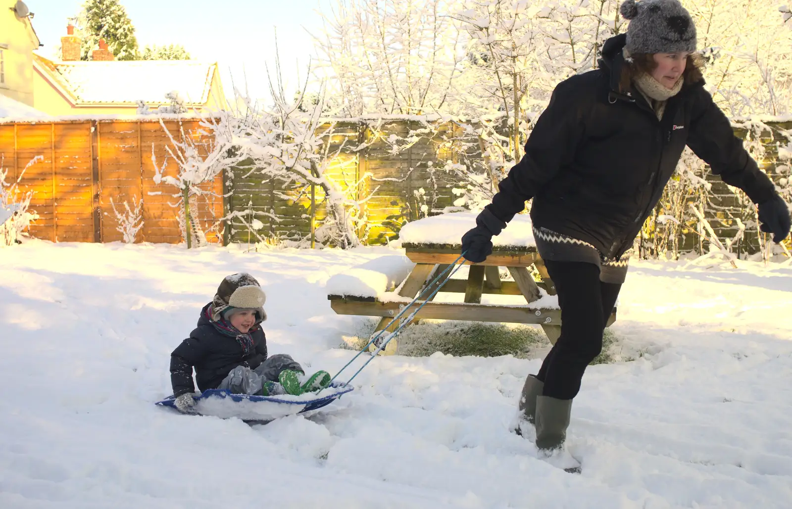 Isobel tows Fred around on a sledge, from A Couple of Snow Days, Brome, Suffolk - 16th January 2013