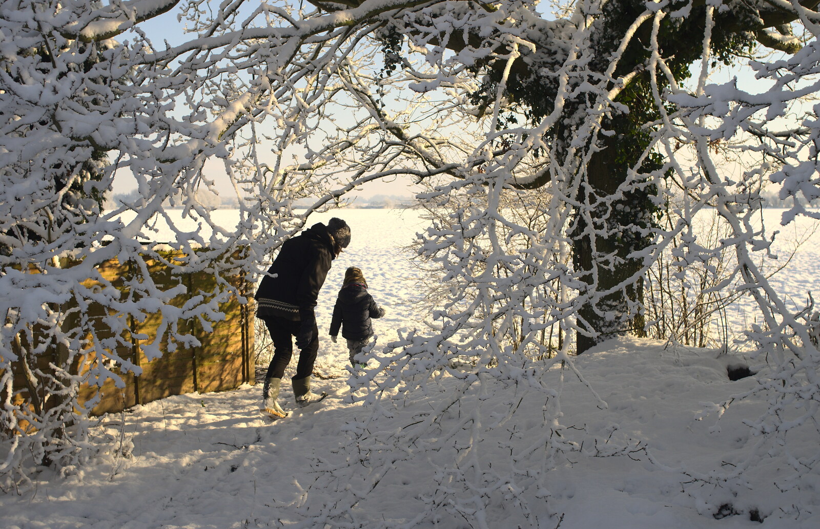 Isobel and Fred head off out the back from A Couple of Snow Days, Brome, Suffolk - 16th January 2013