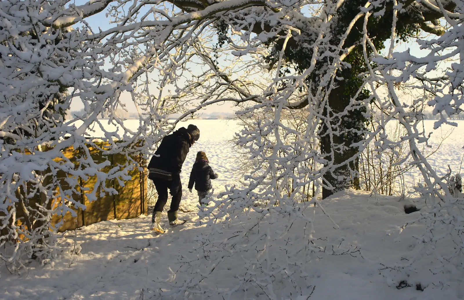 Isobel and Fred head off out the back, from A Couple of Snow Days, Brome, Suffolk - 16th January 2013