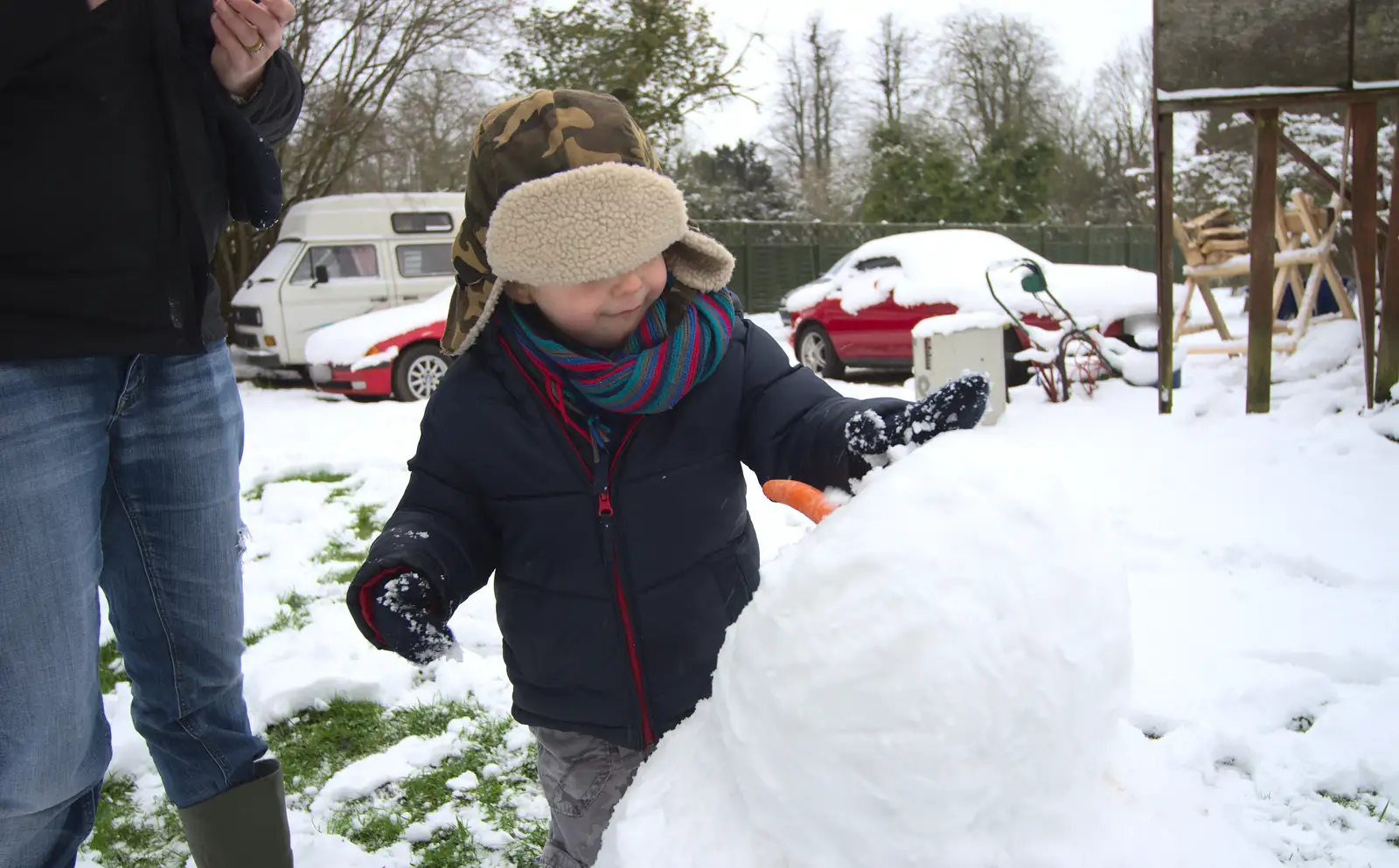 Fred adds some eyes, from More Snow Days and a Wind Turbine is Built, Brome, Suffolk - 19th January 2013