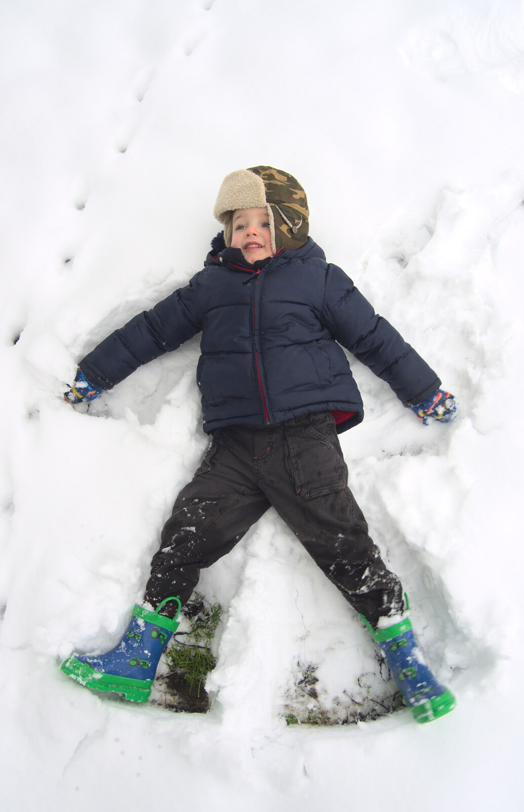 More Snow Days and a Wind Turbine is Built, Brome, Suffolk - 19th January 2013: Fred does a snow angel