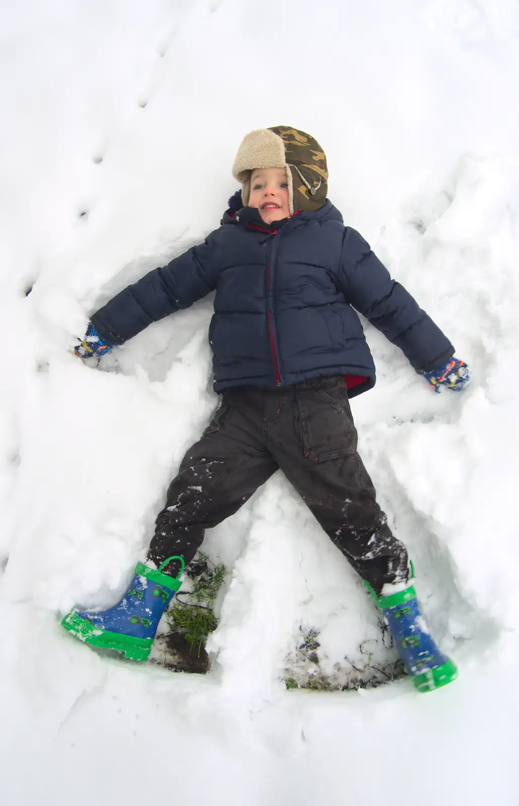 Fred does a snow angel, from More Snow Days and a Wind Turbine is Built, Brome, Suffolk - 19th January 2013