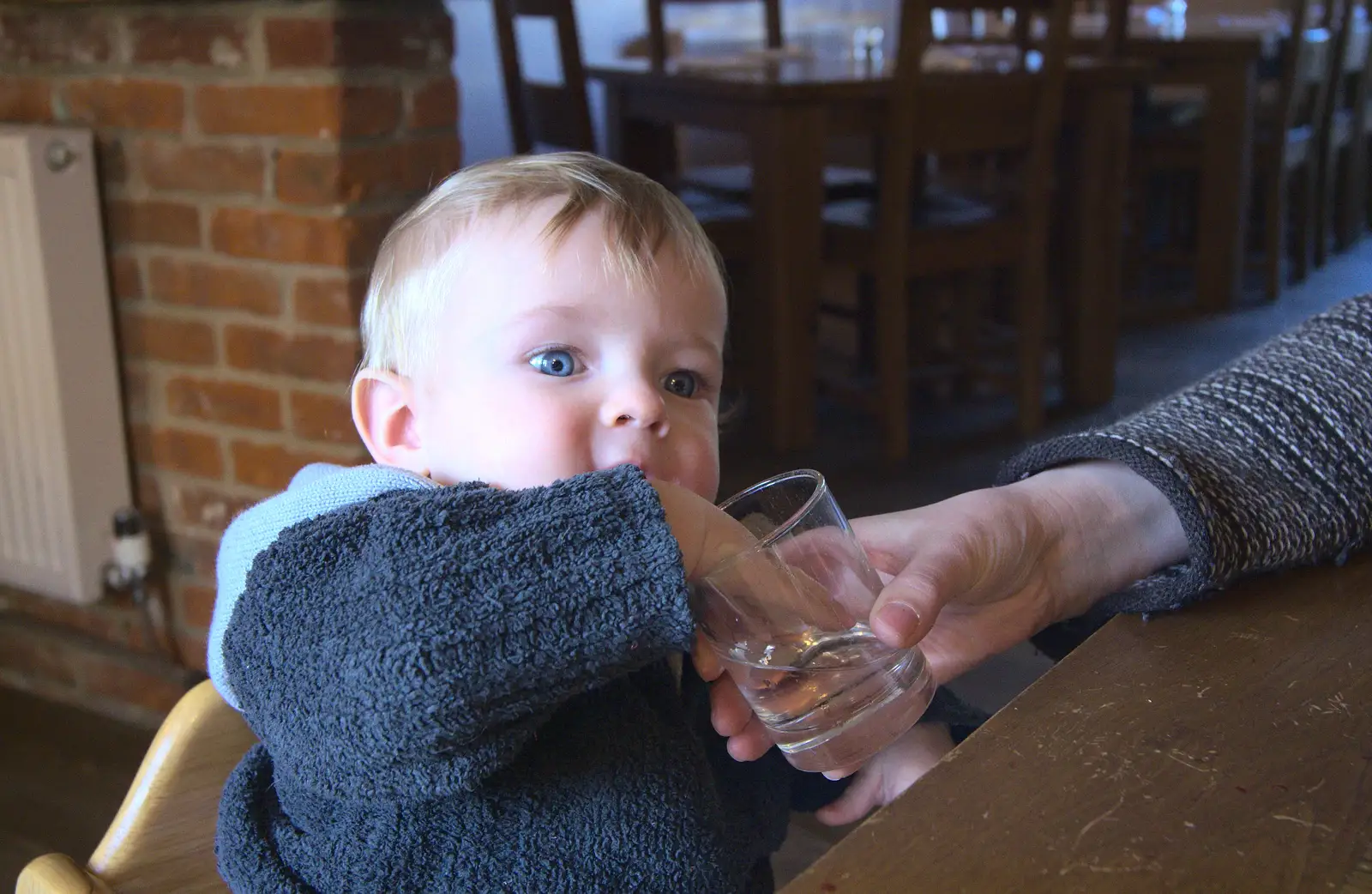 Harry tests some water, from Flooding at the King's Bridge, and Lunch at the Beaconsfield Arms, Suffolk - 27th January 2013