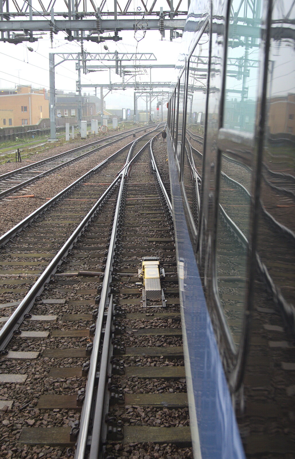 Rails reflected in the side of the train from The Demolition of the Bacon Factory, Ipswich, Suffolk - 20th February 2013