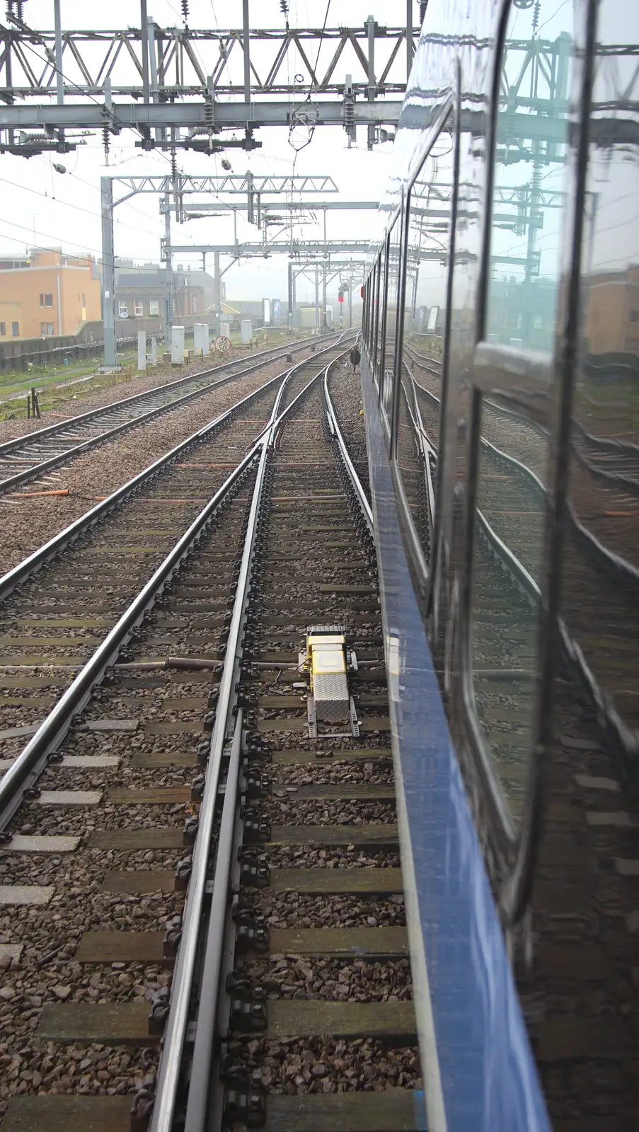 Rails reflected in the side of the train, from The Demolition of the Bacon Factory, Ipswich, Suffolk - 20th February 2013