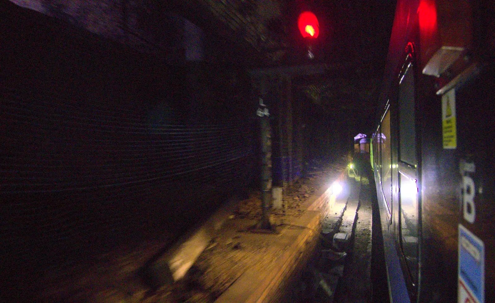 The train passes through the tunnels, from The Demolition of the Bacon Factory, Ipswich, Suffolk - 20th February 2013