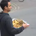 A dude passes samosas around, An Anti-Fascist March, Mill Road, Cambridge - 23rd February 2013