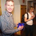 Mikey shows off an award, Mikey P and Andy's 40th Birthday, Thorpe Abbots, Norfolk - 16th March 2013