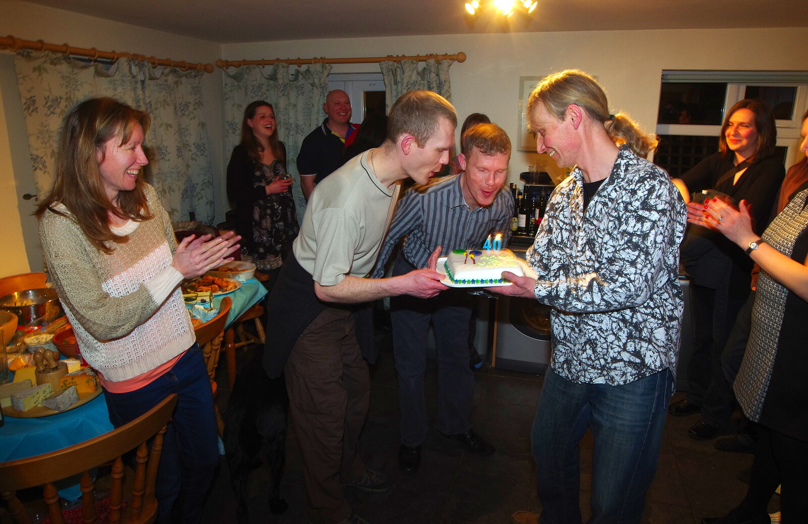 Andy and Mike blow the candles out from Mikey P and Andy's 40th Birthday, Thorpe Abbots, Norfolk - 16th March 2013