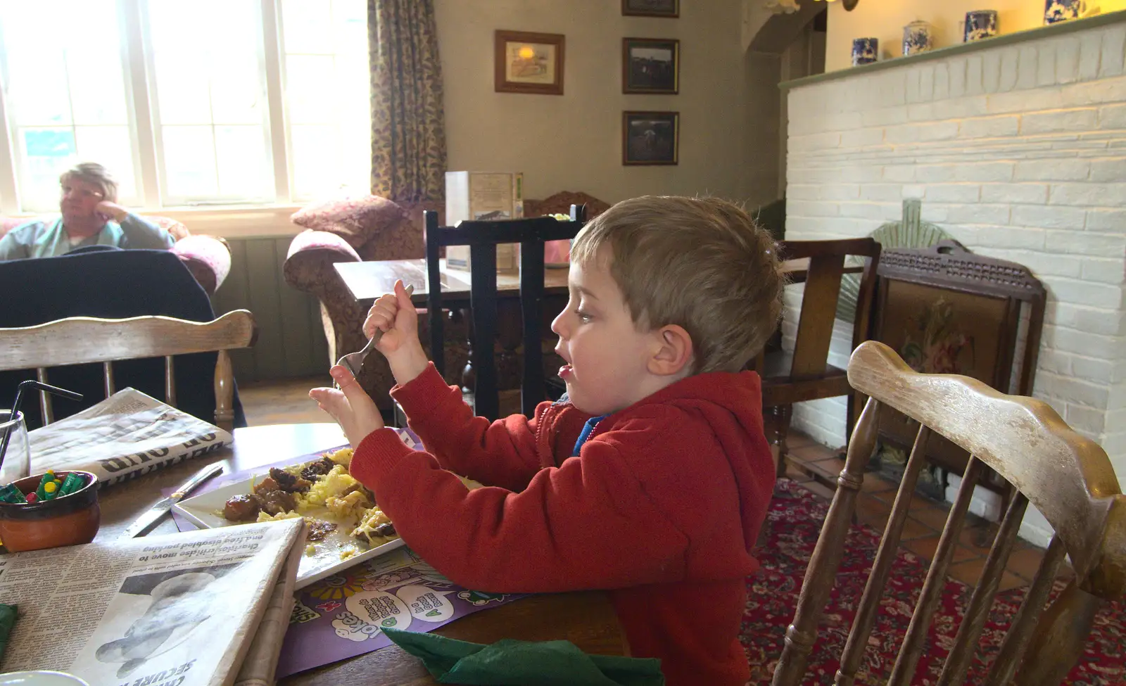 Fred pokes his hand with a fork, from Barton on Sea Beach, and a Trip to Christchurch, Hampshire and Dorset - 19th March 2013