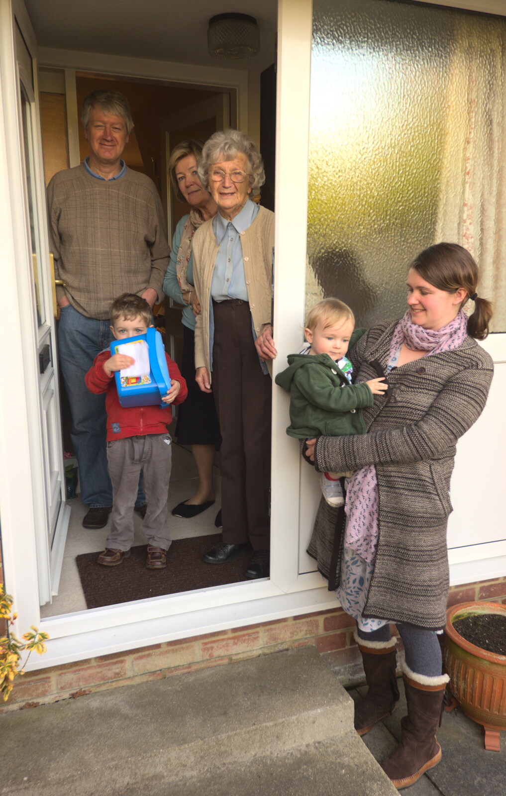 A family portrait by great-grandmother's door from Barton on Sea Beach, and a Trip to Christchurch, Hampshire and Dorset - 19th March 2013