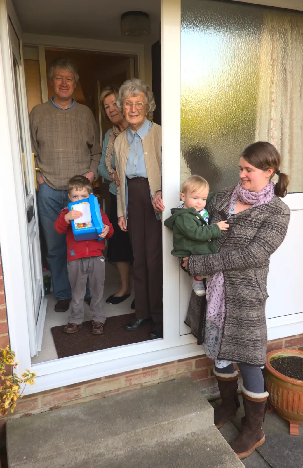 A family portrait by great-grandmother's door, from Barton on Sea Beach, and a Trip to Christchurch, Hampshire and Dorset - 19th March 2013