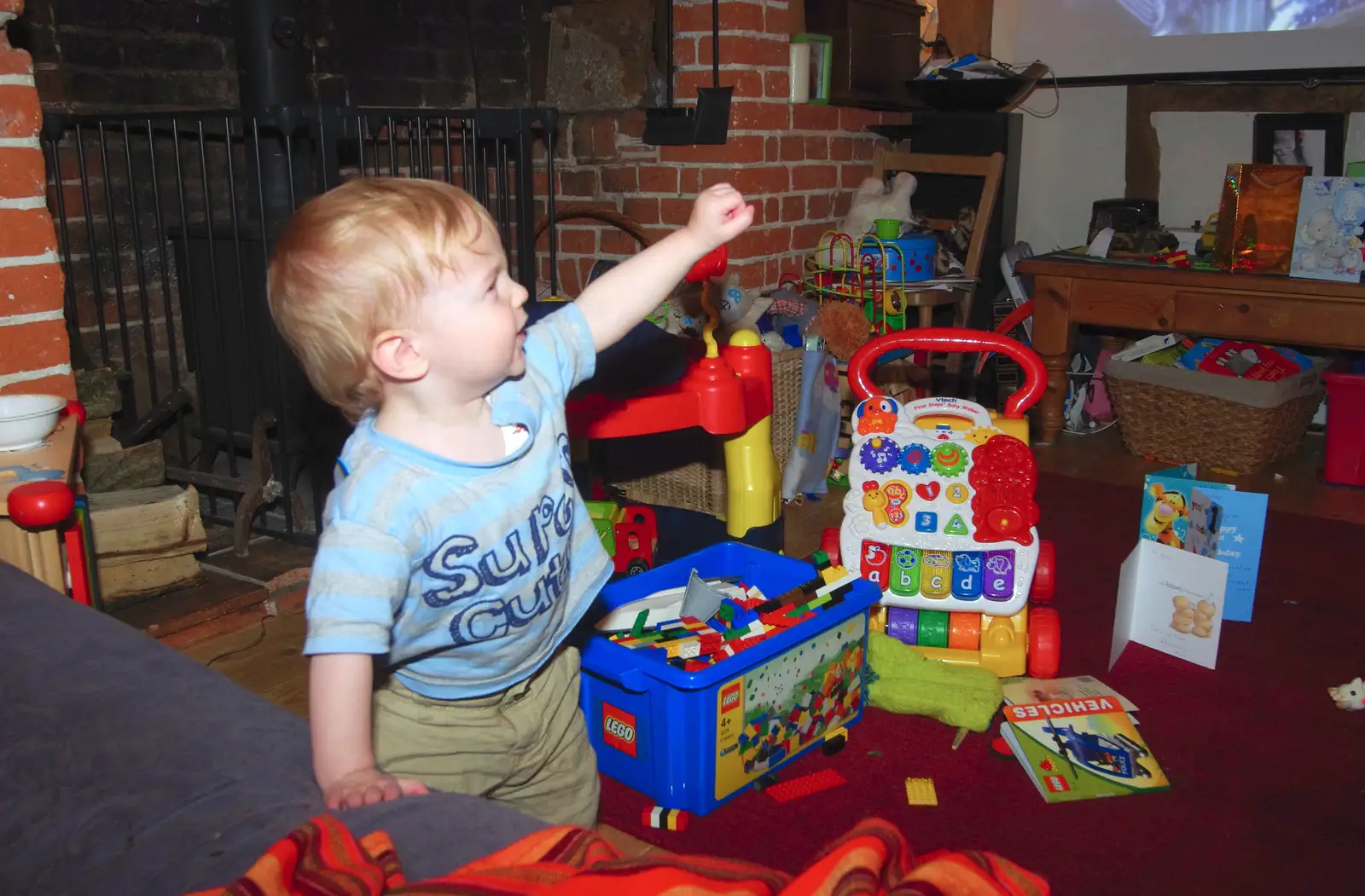 Harry is surrounded by toys, from An Easter Visit from Da Gorls, Brome, Suffolk - 2nd April 2013