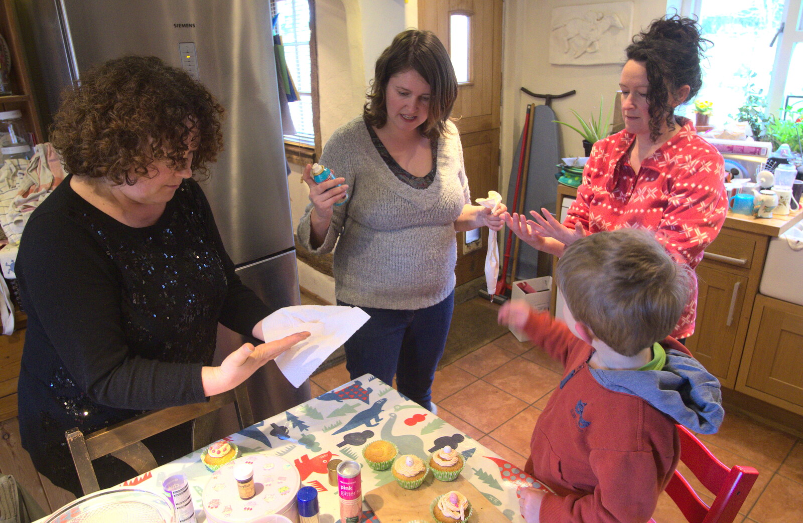 There's some cake decorating going on from An Easter Visit from Da Gorls, Brome, Suffolk - 2nd April 2013