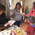 There's some cake decorating going on, An Easter Visit from Da Gorls, Brome, Suffolk - 2nd April 2013