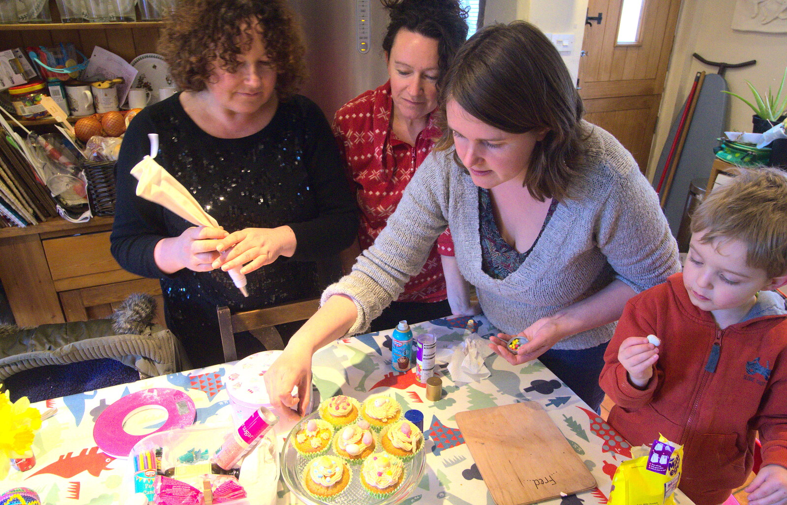 Louise is poised with an icing bag from An Easter Visit from Da Gorls, Brome, Suffolk - 2nd April 2013