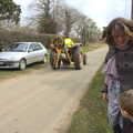 A tractor trundles down the road, An Easter Visit from Da Gorls, Brome, Suffolk - 2nd April 2013