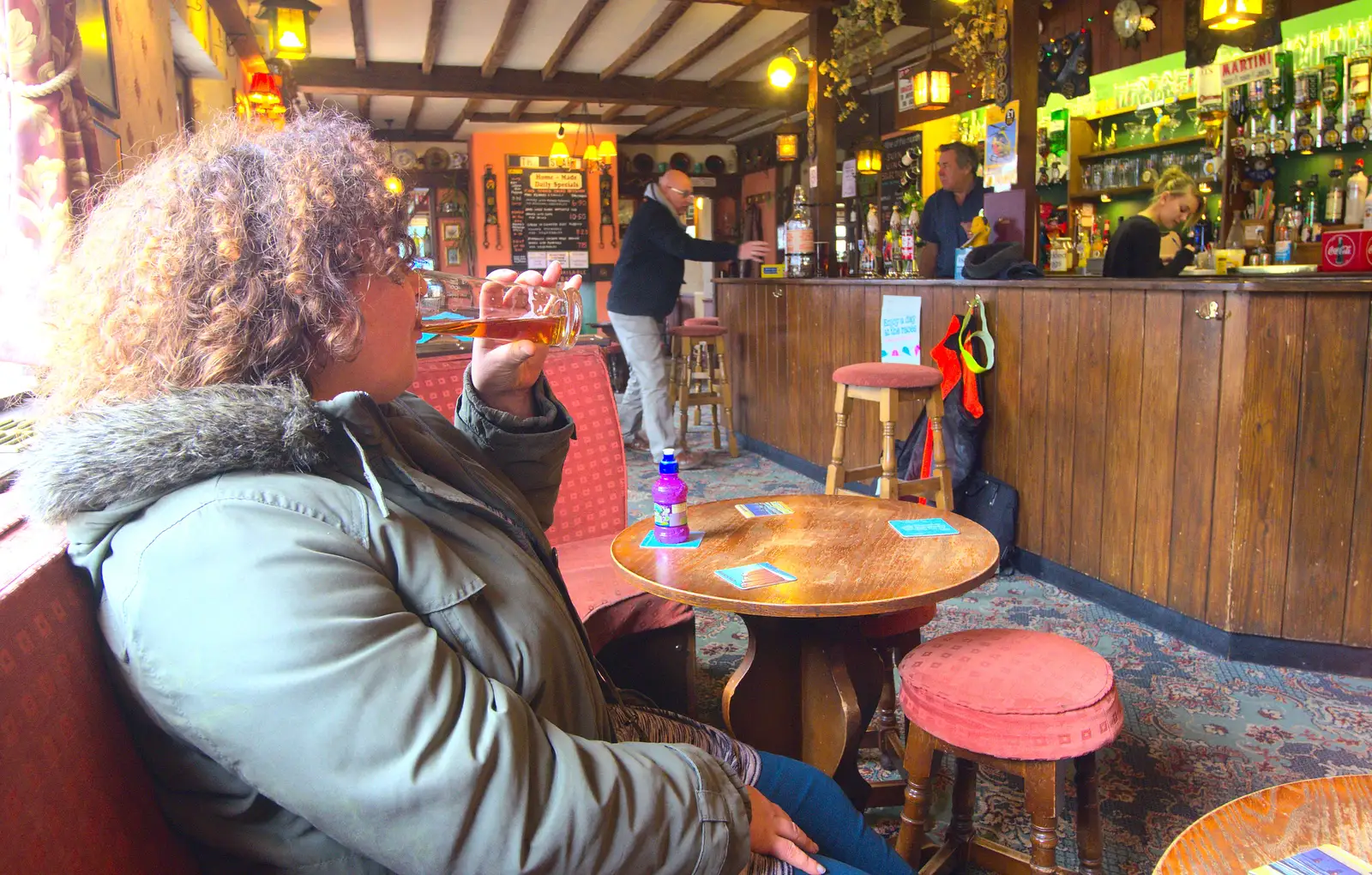 Louise slurps some ale, from An Easter Visit from Da Gorls, Brome, Suffolk - 2nd April 2013