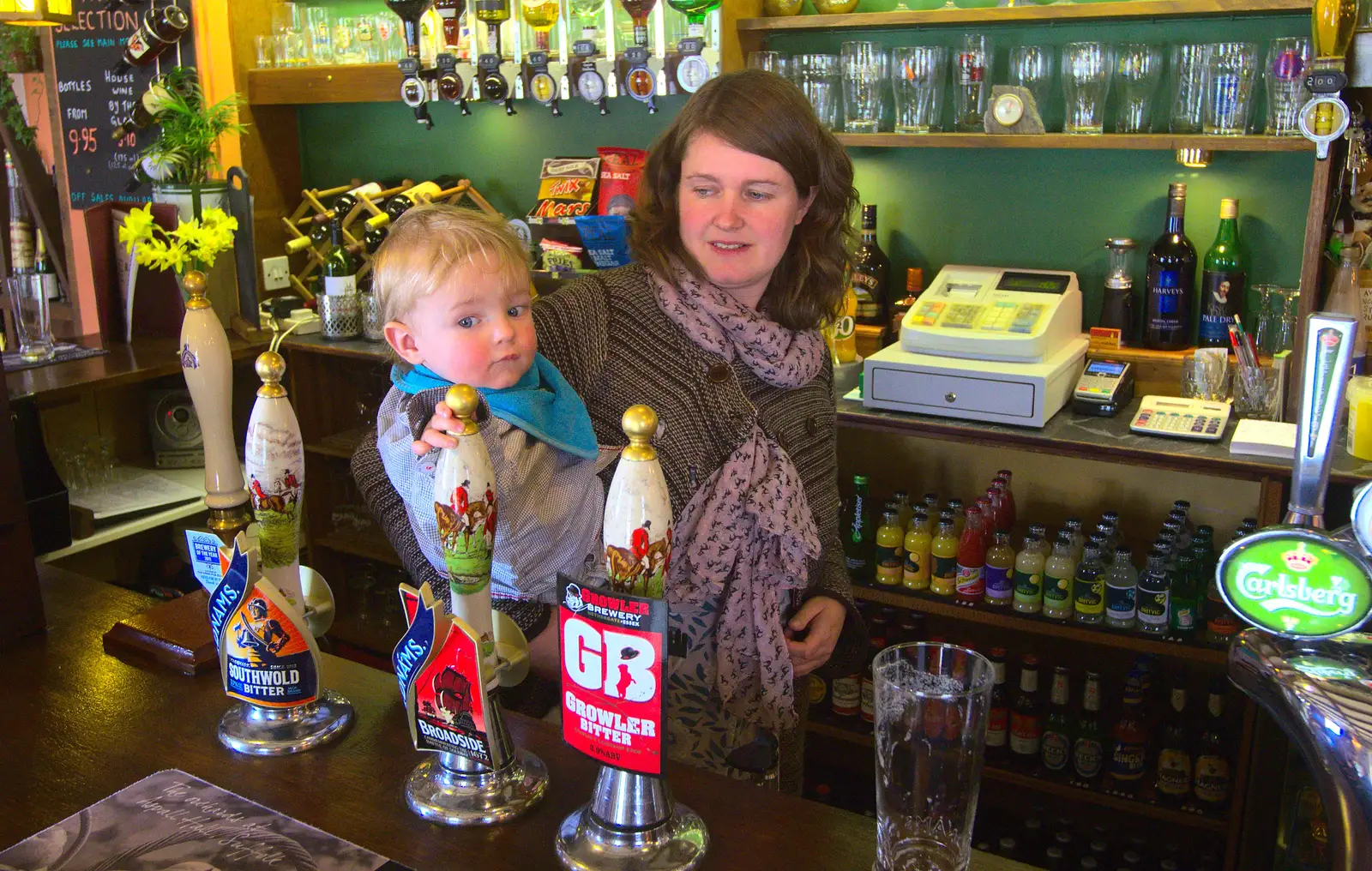 Harry tries his hand at pulling a pint, from An Easter Visit from Da Gorls, Brome, Suffolk - 2nd April 2013