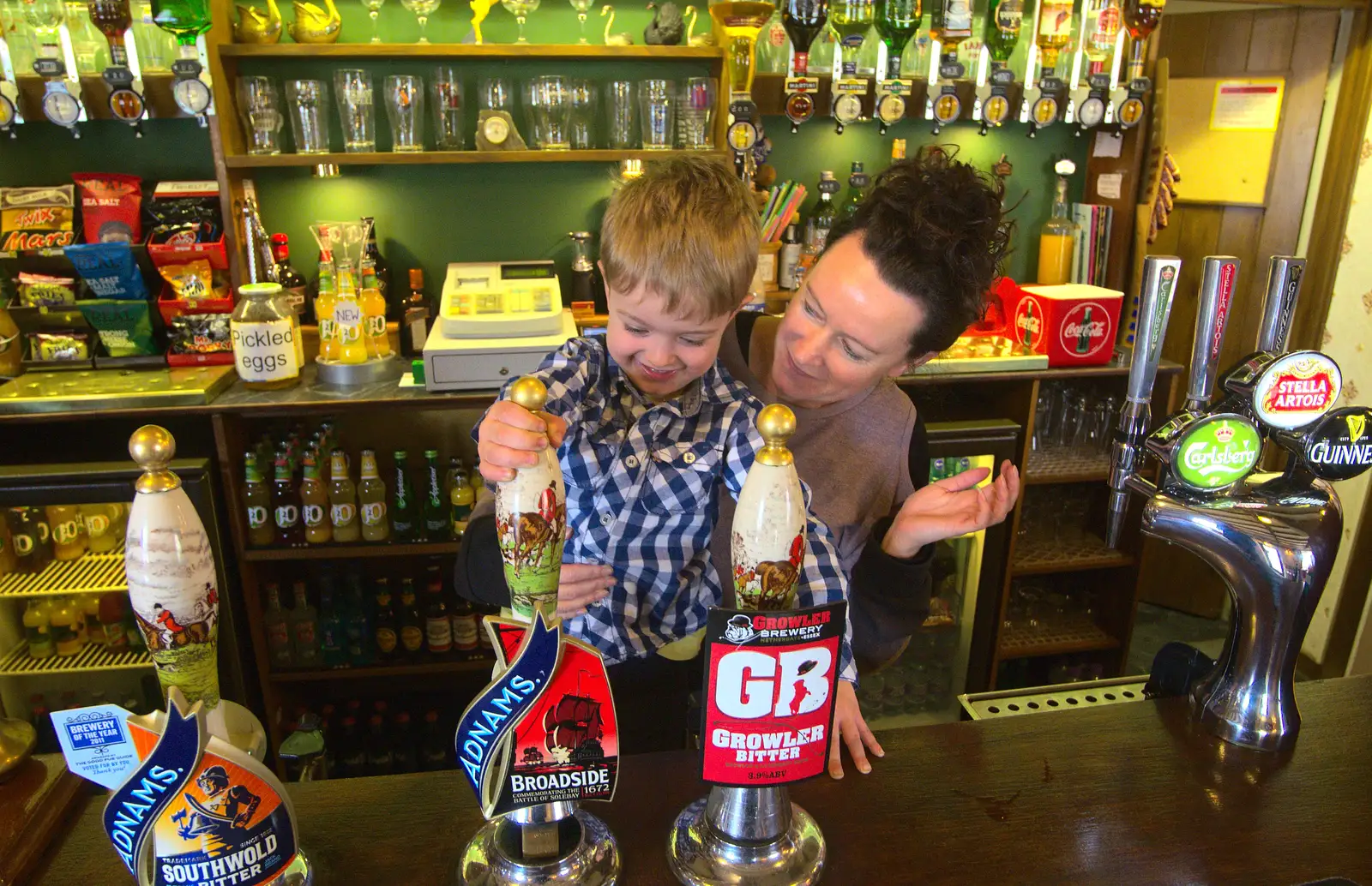 Evelyn helps Fred pull a pint, from An Easter Visit from Da Gorls, Brome, Suffolk - 2nd April 2013