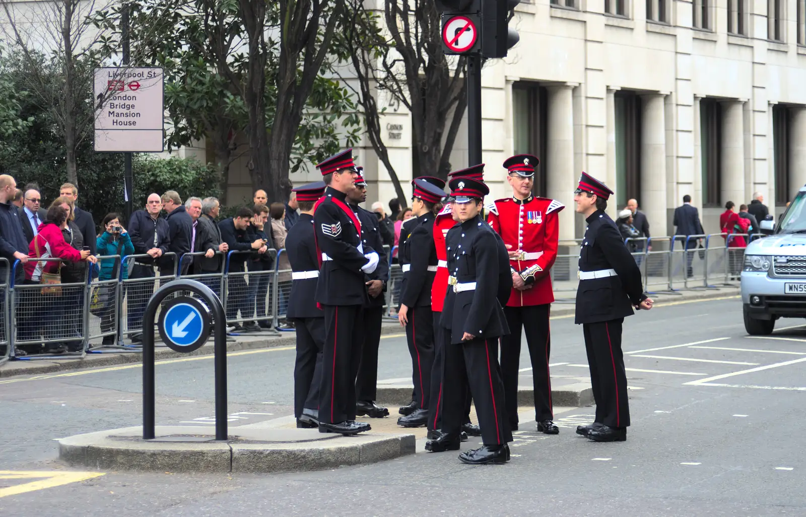 Military types hang around on a traffic island, from Margaret Thatcher's Funeral, St. Paul's, London - 17th April 2013