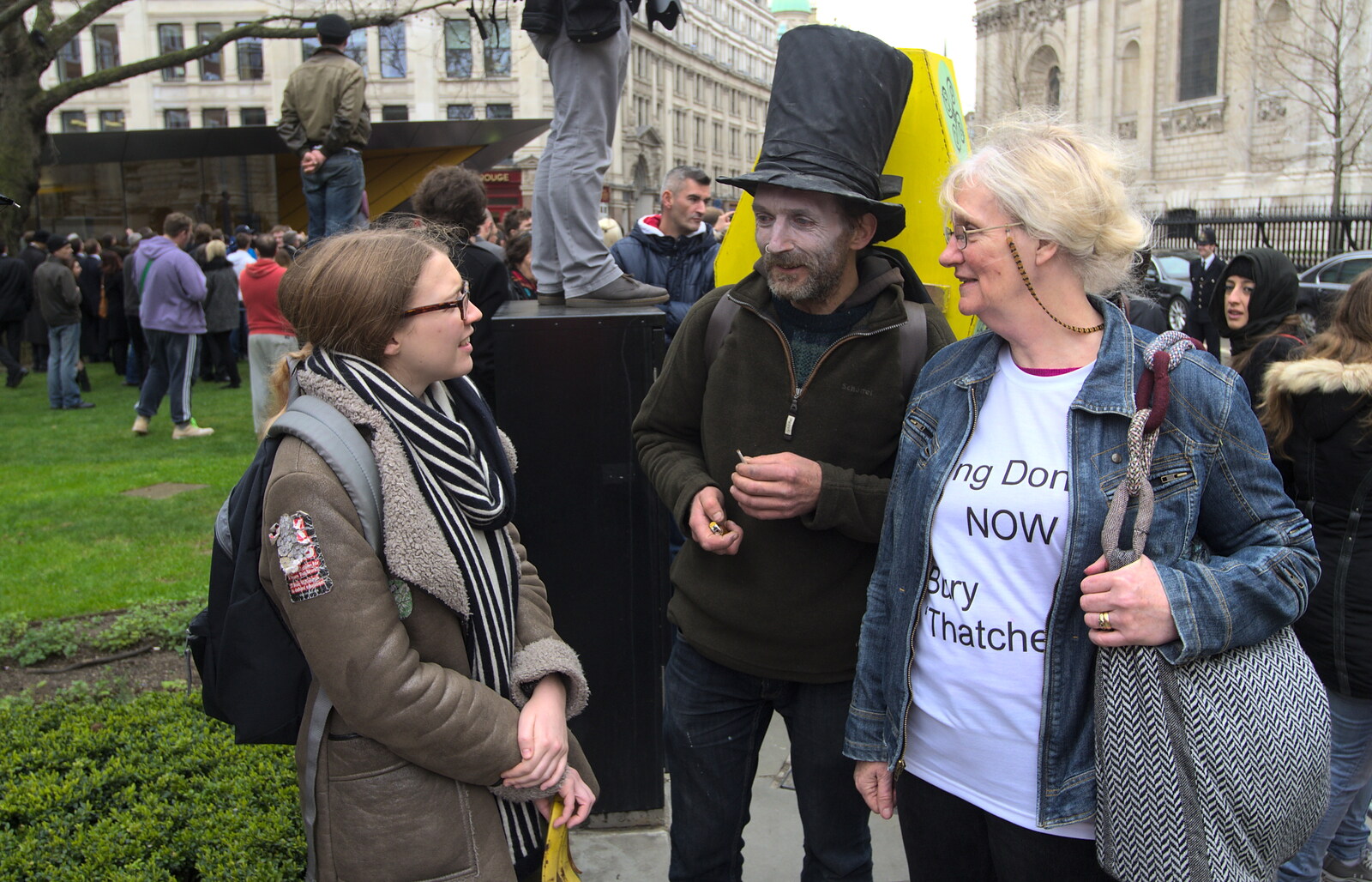 The anti-Thatcherites are quizzed by a student from Margaret Thatcher's Funeral, St. Paul's, London - 17th April 2013