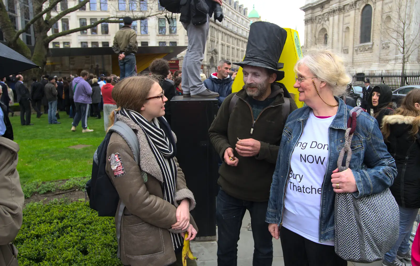 The anti-Thatcherites are quizzed by a student, from Margaret Thatcher's Funeral, St. Paul's, London - 17th April 2013