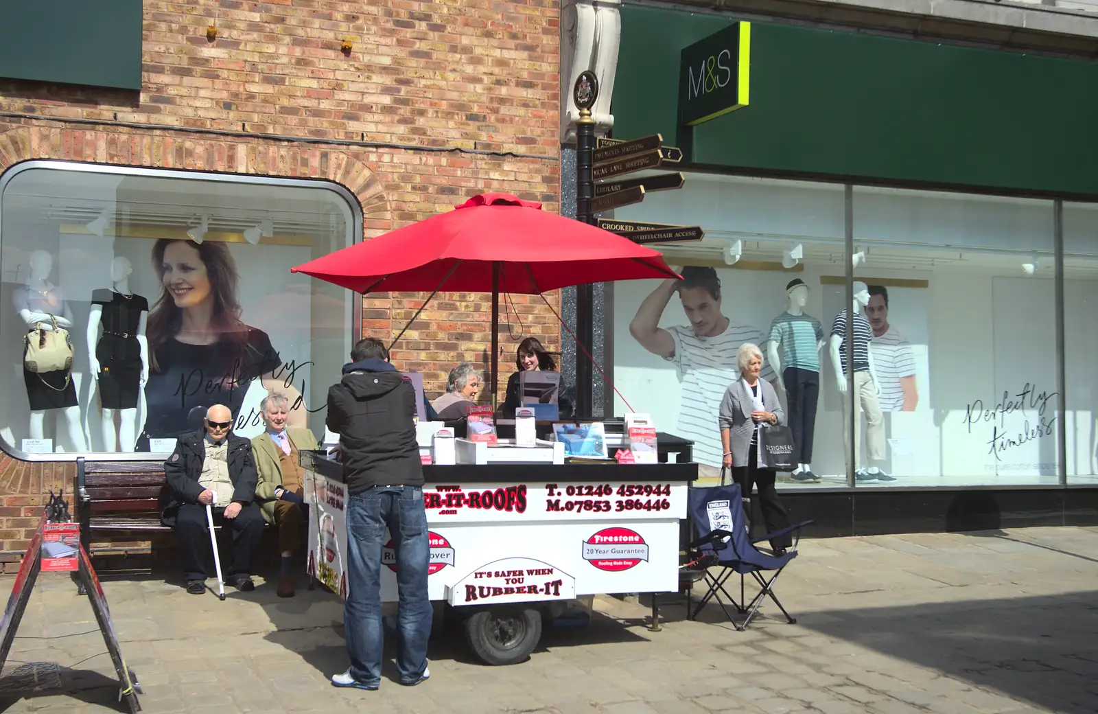 A portable stall tries to sell rubber roofing, from Chesterfield and the Twisty Spire, Derbyshire - 19th April 2013