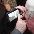 James looks at an old 1940s photo, Uncle James's Ninetieth Birthday, Cheadle Hulme, Manchester - 20th April 2013