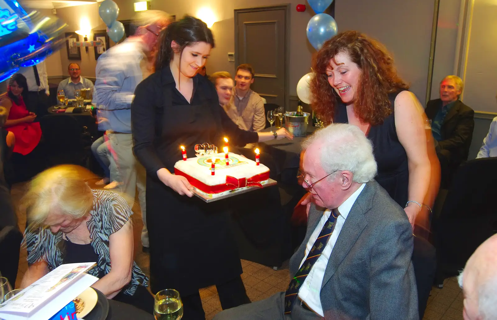 A birthday cake is brought in, from Uncle James's Ninetieth Birthday, Cheadle Hulme, Manchester - 20th April 2013