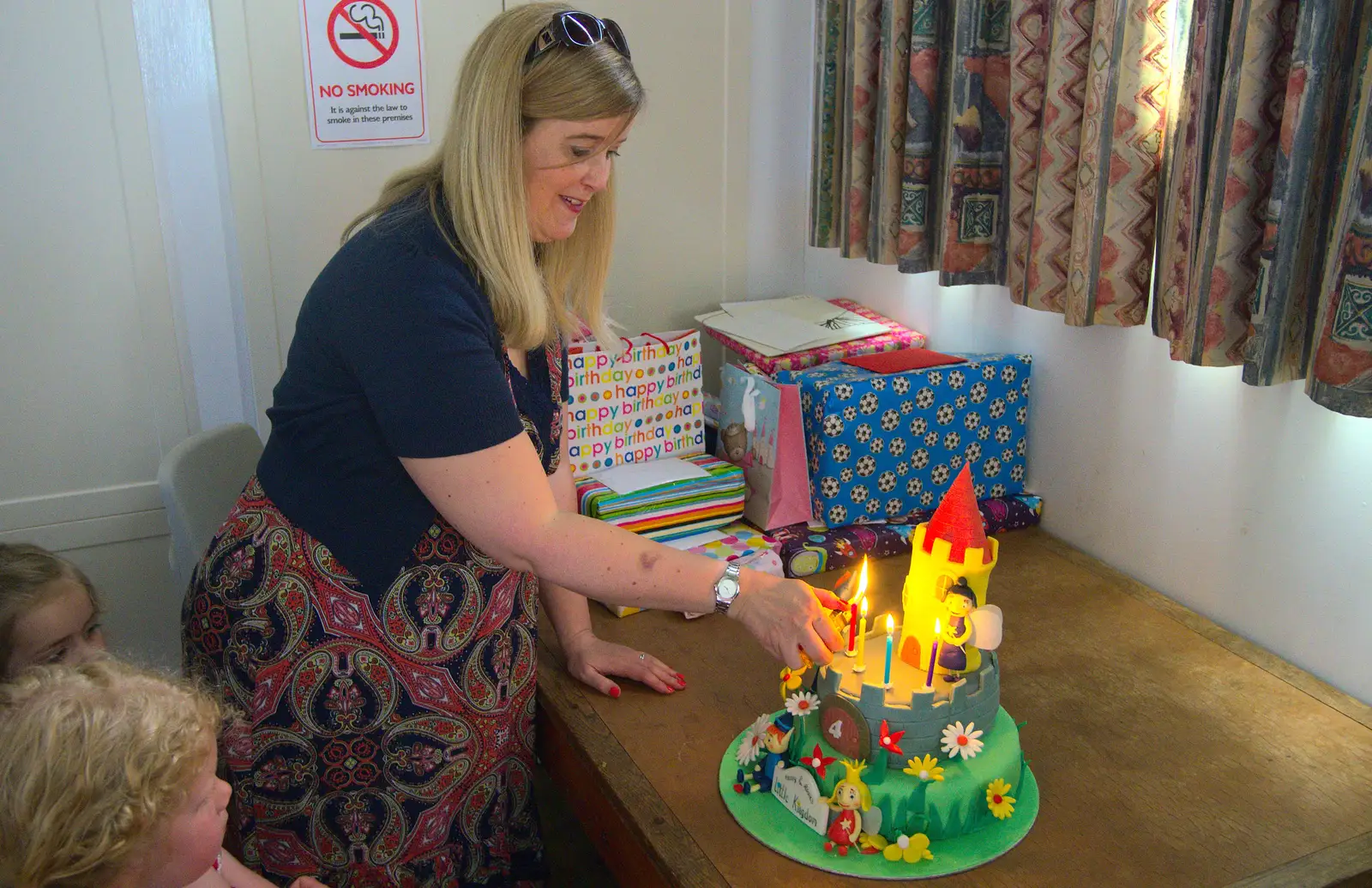 Helen lights the cake, from Rosie and Henry's Birthday Party, Mellis, Suffolk - 5th May 2013