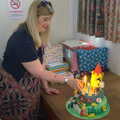 Helen lights the cake, Rosie and Henry's Birthday Party, Mellis, Suffolk - 5th May 2013