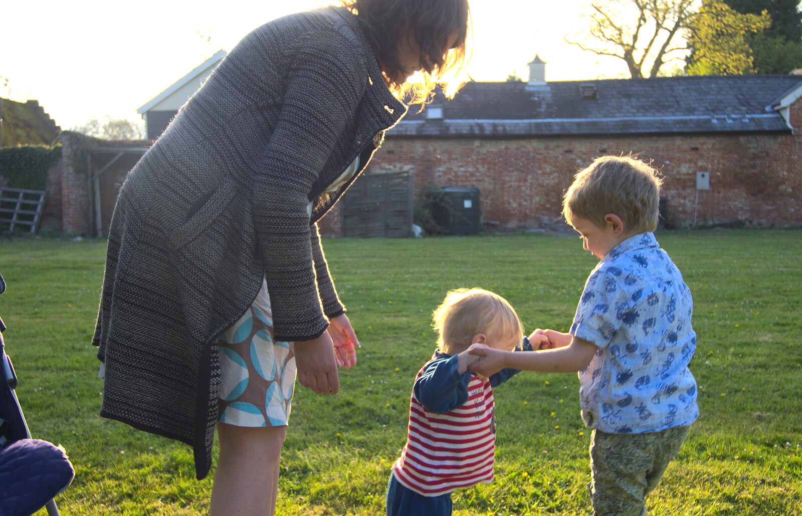 Fred holds Harry up as he potters around from Rosie and Henry's Birthday Party, Mellis, Suffolk - 5th May 2013