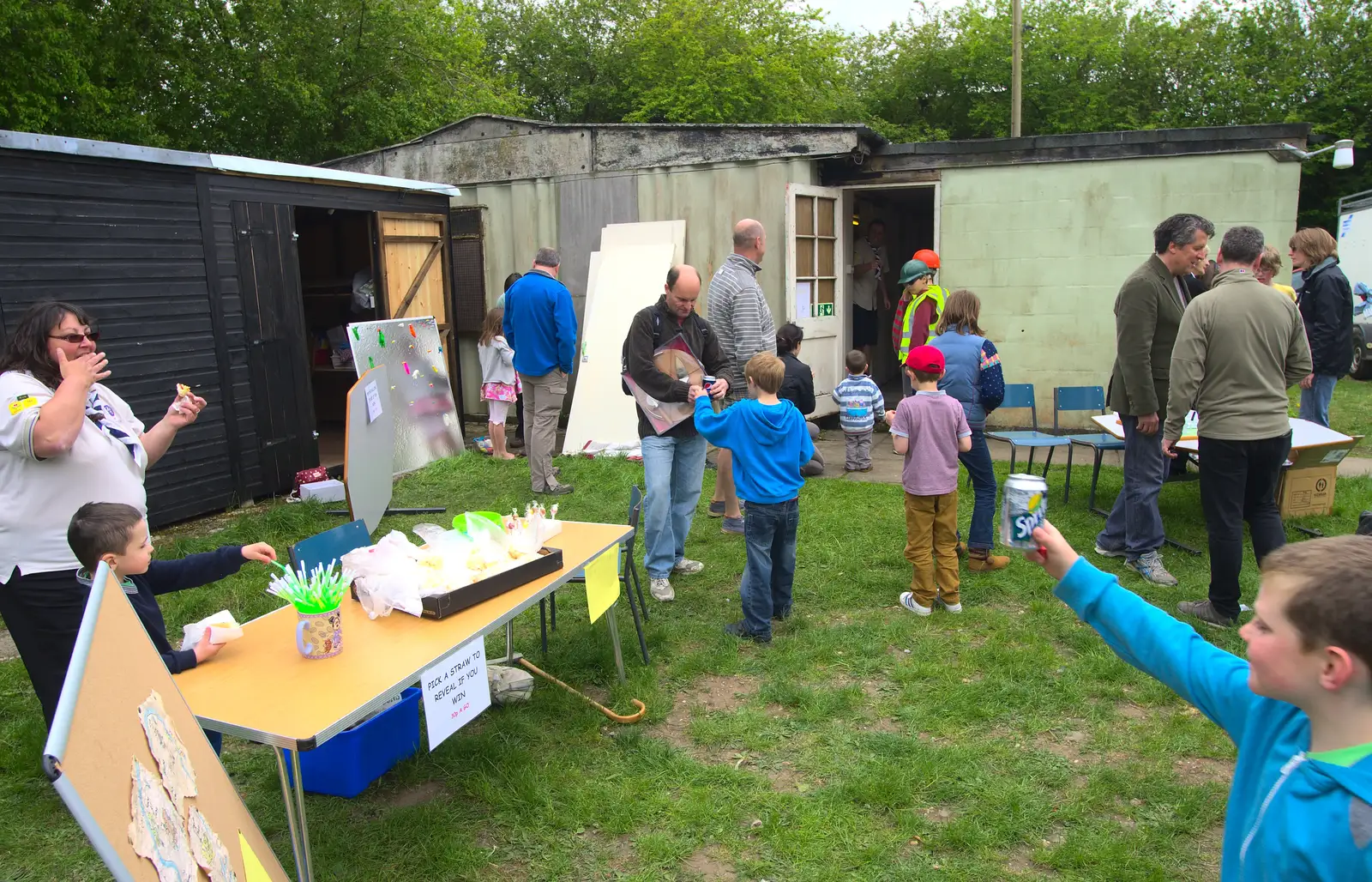 Carrie mans the 'pick a straw' lucky dip, from Demolishing The 1st Eye Scout Hut, Wellington Road, Eye, Suffolk - 11th May 2013