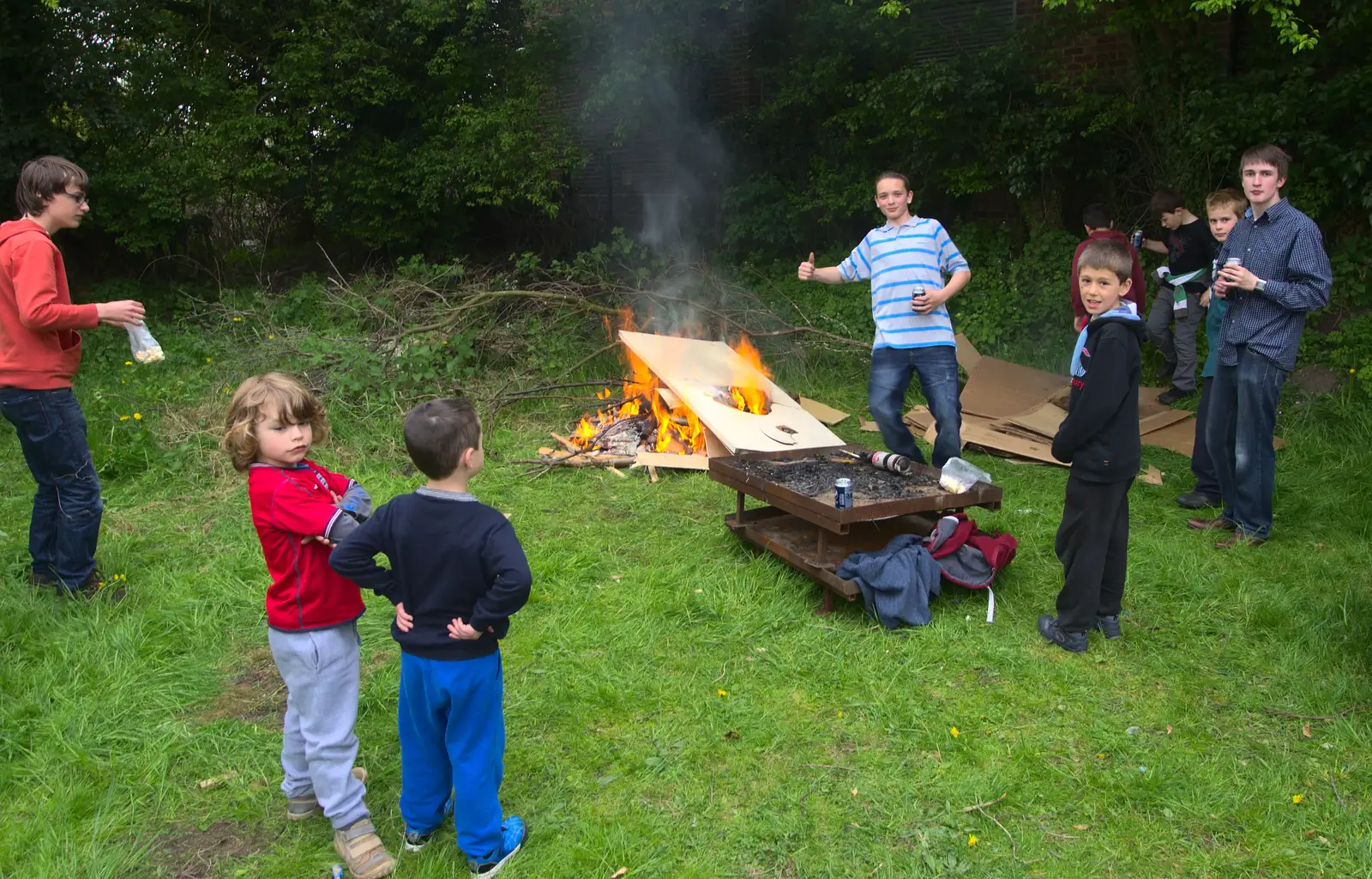 Thumbs up for the fire, from Demolishing The 1st Eye Scout Hut, Wellington Road, Eye, Suffolk - 11th May 2013