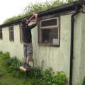 An opportunist makes off with the guttering, Demolishing The 1st Eye Scout Hut, Wellington Road, Eye, Suffolk - 11th May 2013