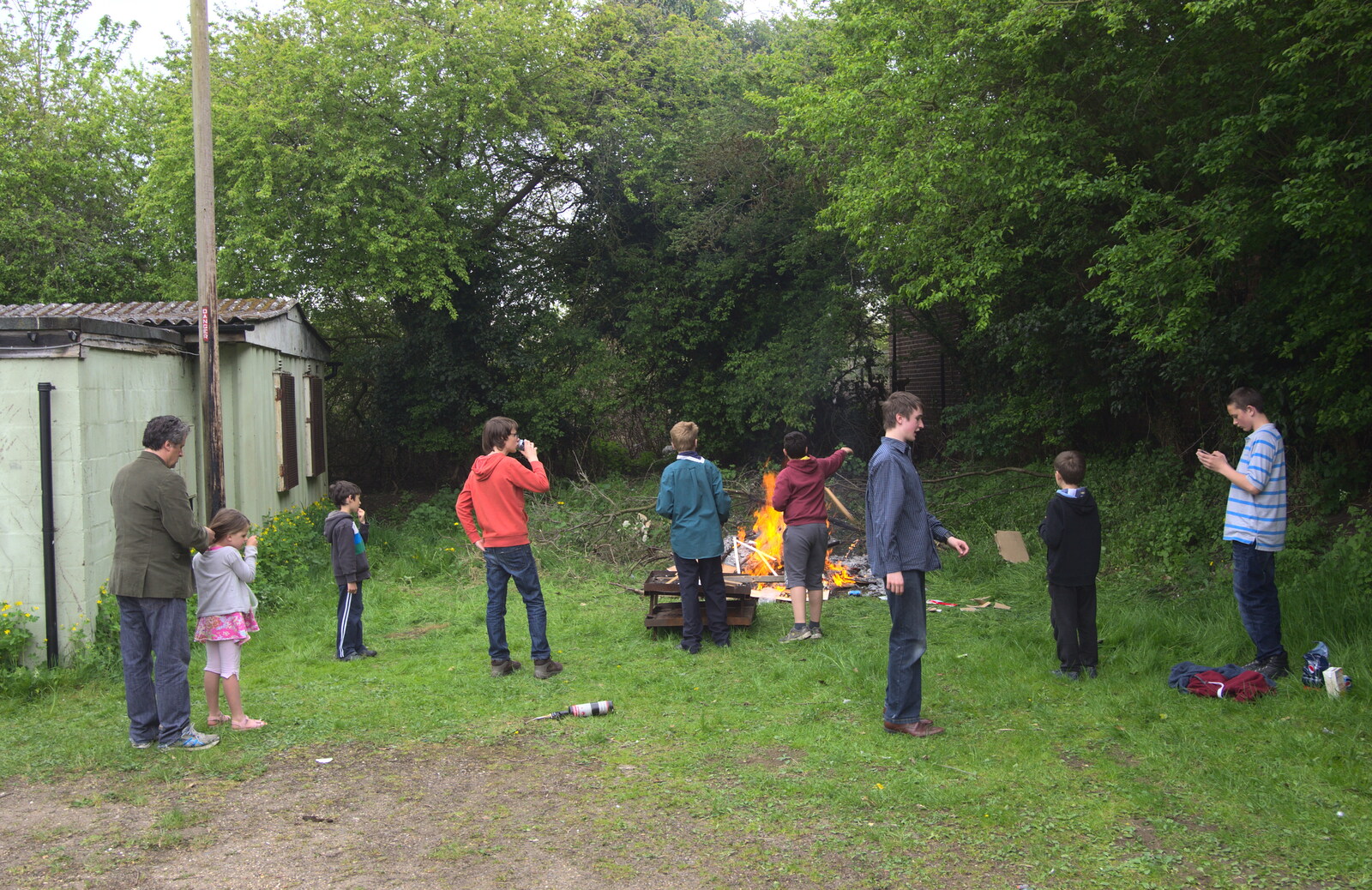 A crowd builds up by the fire from Demolishing The 1st Eye Scout Hut, Wellington Road, Eye, Suffolk - 11th May 2013