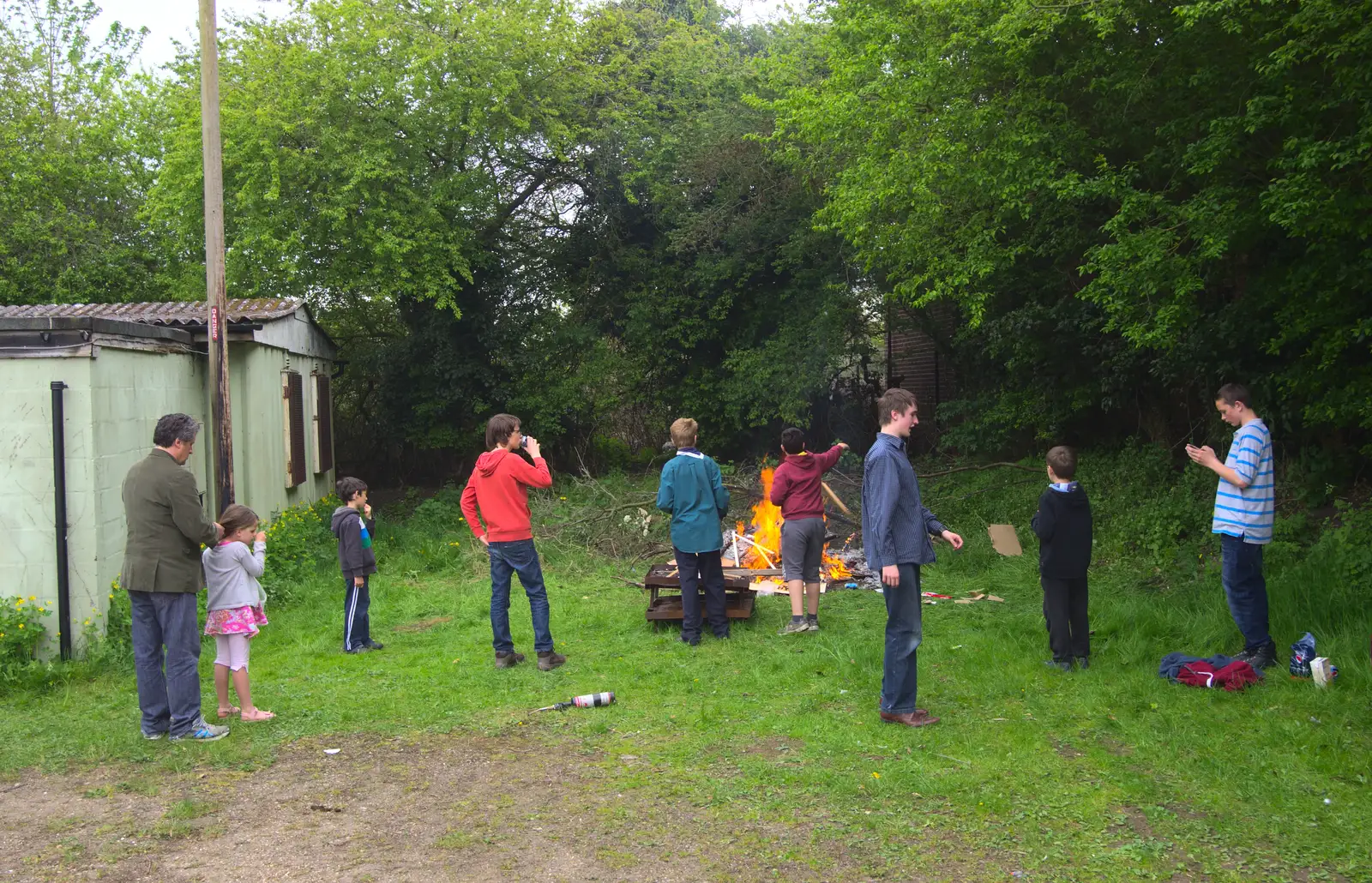 A crowd builds up by the fire, from Demolishing The 1st Eye Scout Hut, Wellington Road, Eye, Suffolk - 11th May 2013