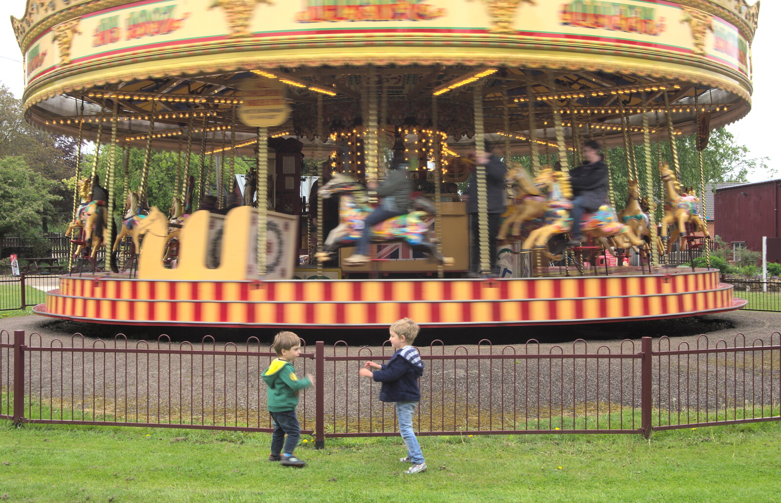 Kaine and Fred in front of the Gallopers from A Day at Bressingham Steam and Gardens, Diss, Norfolk - 18th May 2013
