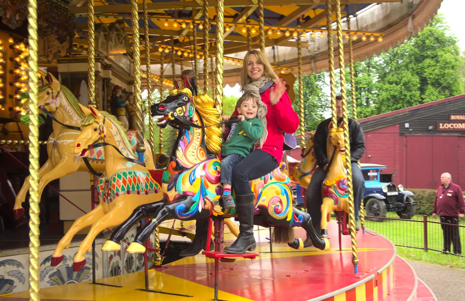 Kaine and Janet have another go on the gallopers, from A Day at Bressingham Steam and Gardens, Diss, Norfolk - 18th May 2013