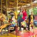 Kaine and Janet have another go on the gallopers, A Day at Bressingham Steam and Gardens, Diss, Norfolk - 18th May 2013