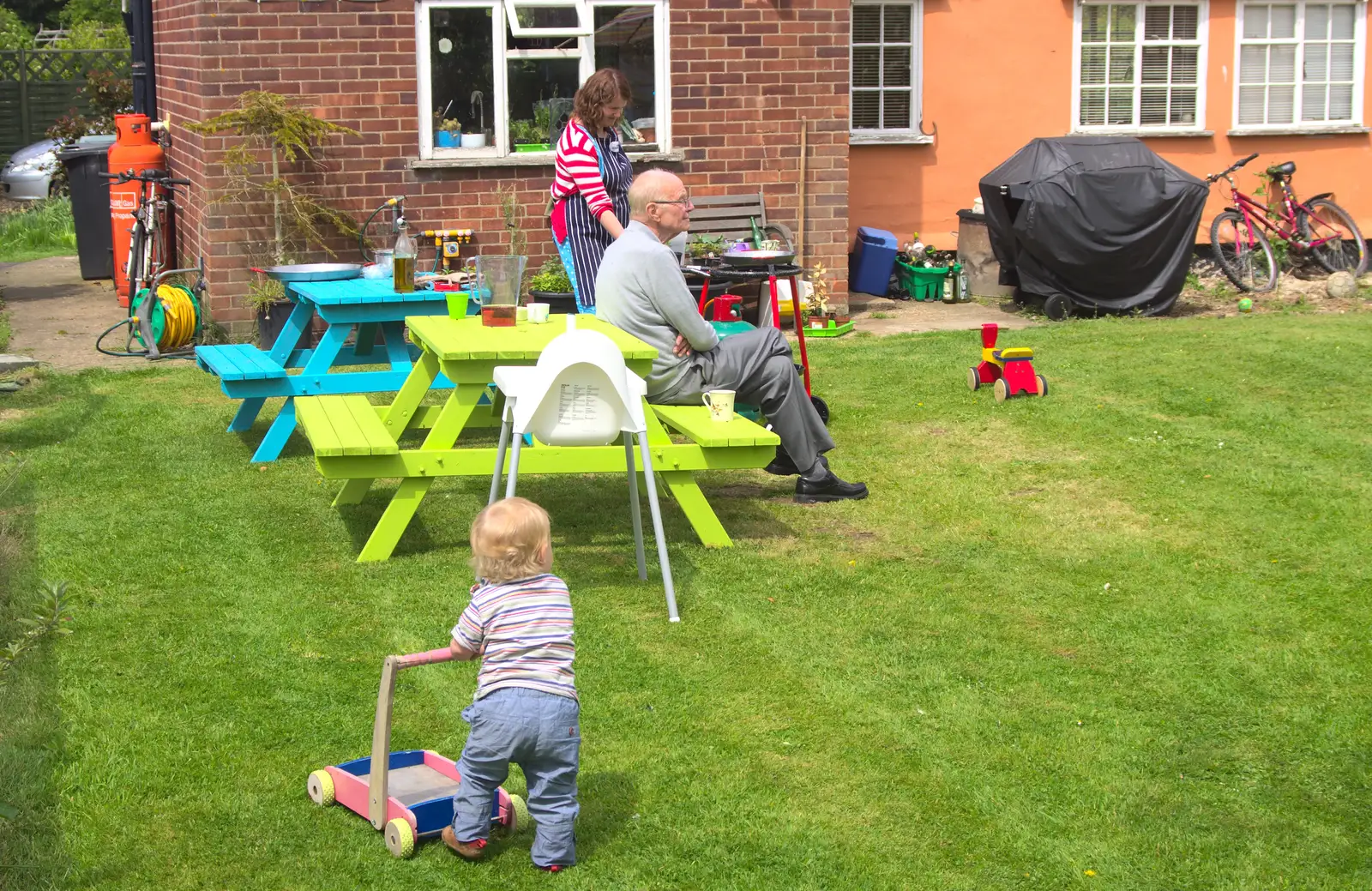 Grandad sits on a bench as Harry trundles, from The BBs: Jo and Rob at the Cock Inn, Fair Green, Diss, Norfolk - 19th May 2013