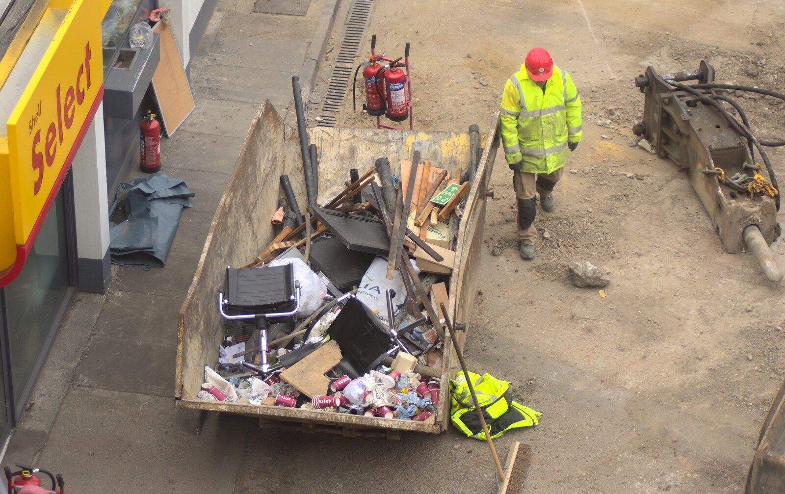 A skip is filled up with stuff out of the shop from Tangmere at Norwich Station, Norwich, Norfolk - 25th May 2013