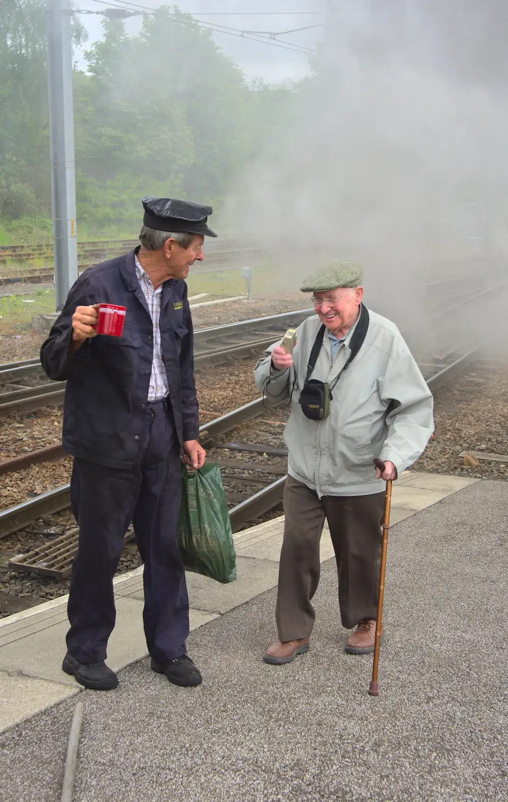 An old dude is reprimanded for trespassing, from Tangmere at Norwich Station, Norwich, Norfolk - 25th May 2013