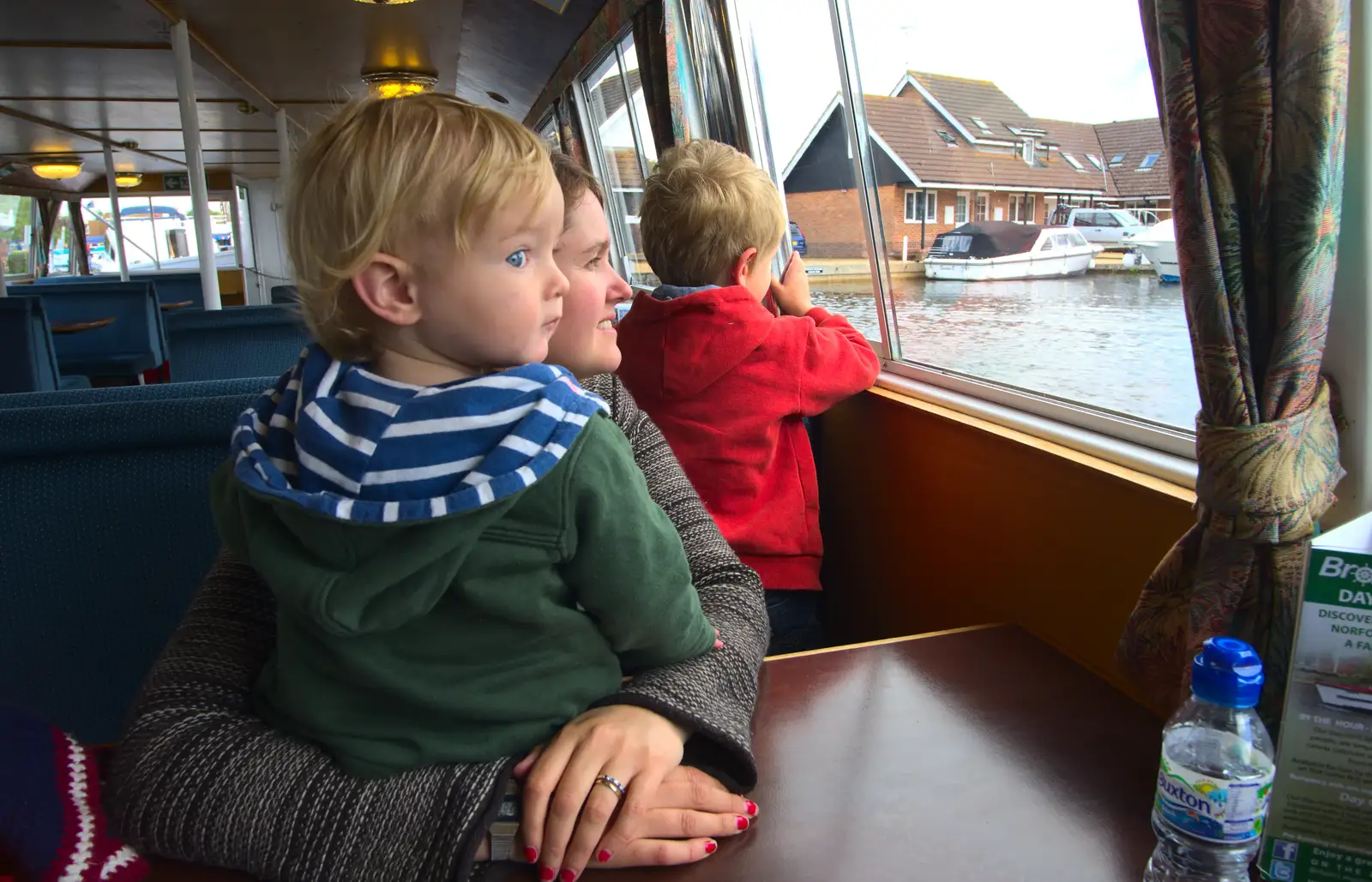 Harry and Isobel look out of the window, from A Trip on the Norfolk Broads, Wroxham, Norfolk - 25th May 2013