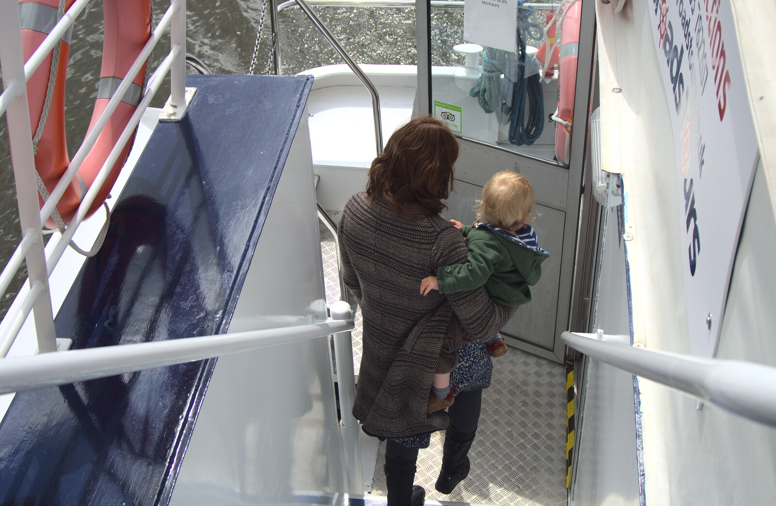Isobel carries Harry doenstairs from A Trip on the Norfolk Broads, Wroxham, Norfolk - 25th May 2013