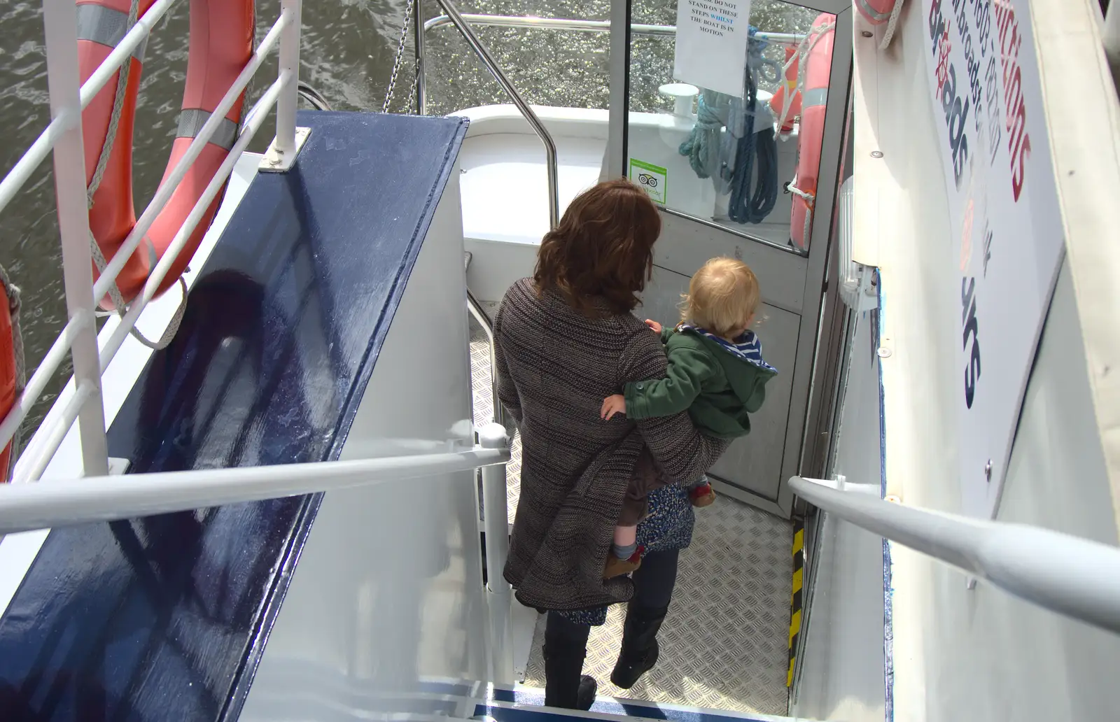 Isobel carries Harry doenstairs, from A Trip on the Norfolk Broads, Wroxham, Norfolk - 25th May 2013