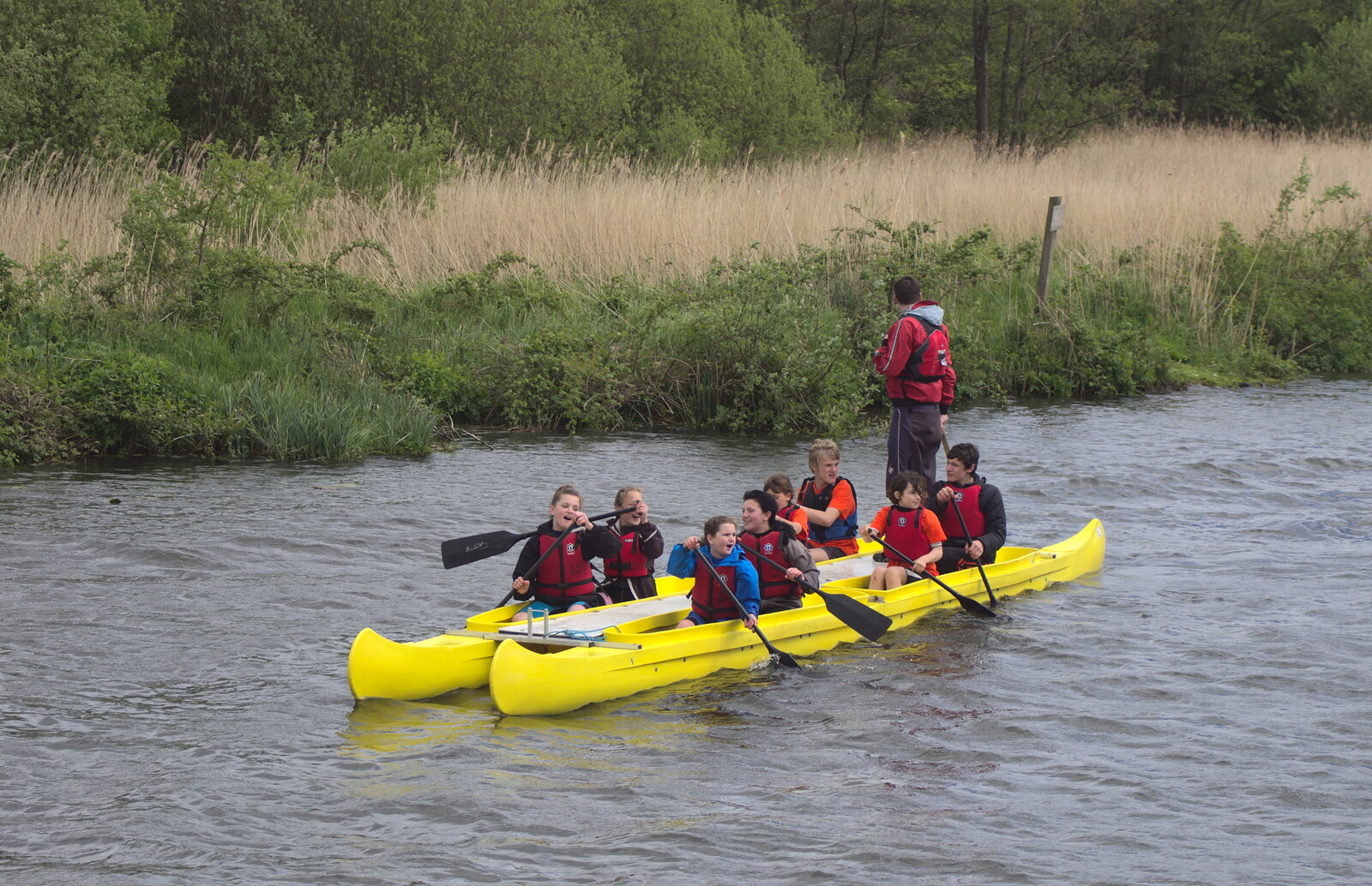 Teenagers paddle a canoe singing 'Summer Holiday' from A Trip on the Norfolk Broads, Wroxham, Norfolk - 25th May 2013