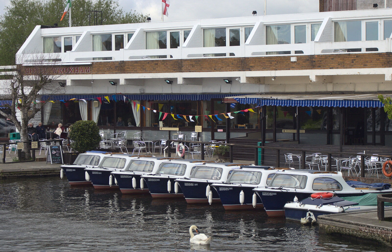 A line up of boats, and the 70s Hotel Wroxham from A Trip on the Norfolk Broads, Wroxham, Norfolk - 25th May 2013